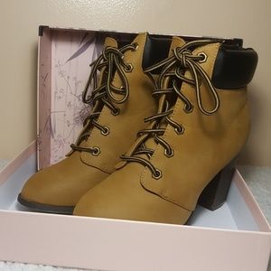 Laced up heel boots